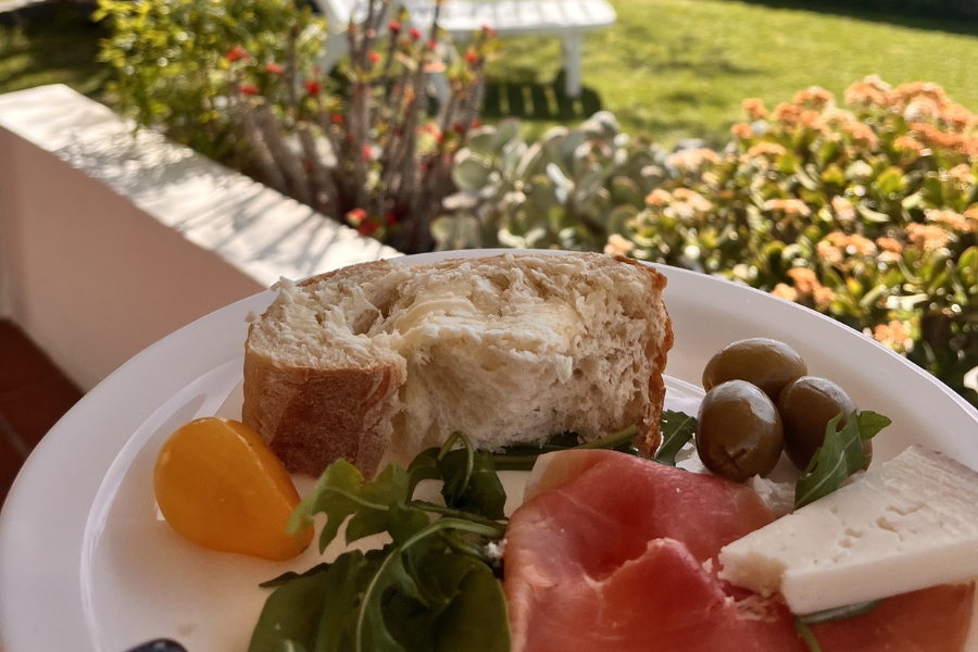 Local food purchased at the Santa Brigida market Local produce platter for Santa Brigida lunch with mountain view